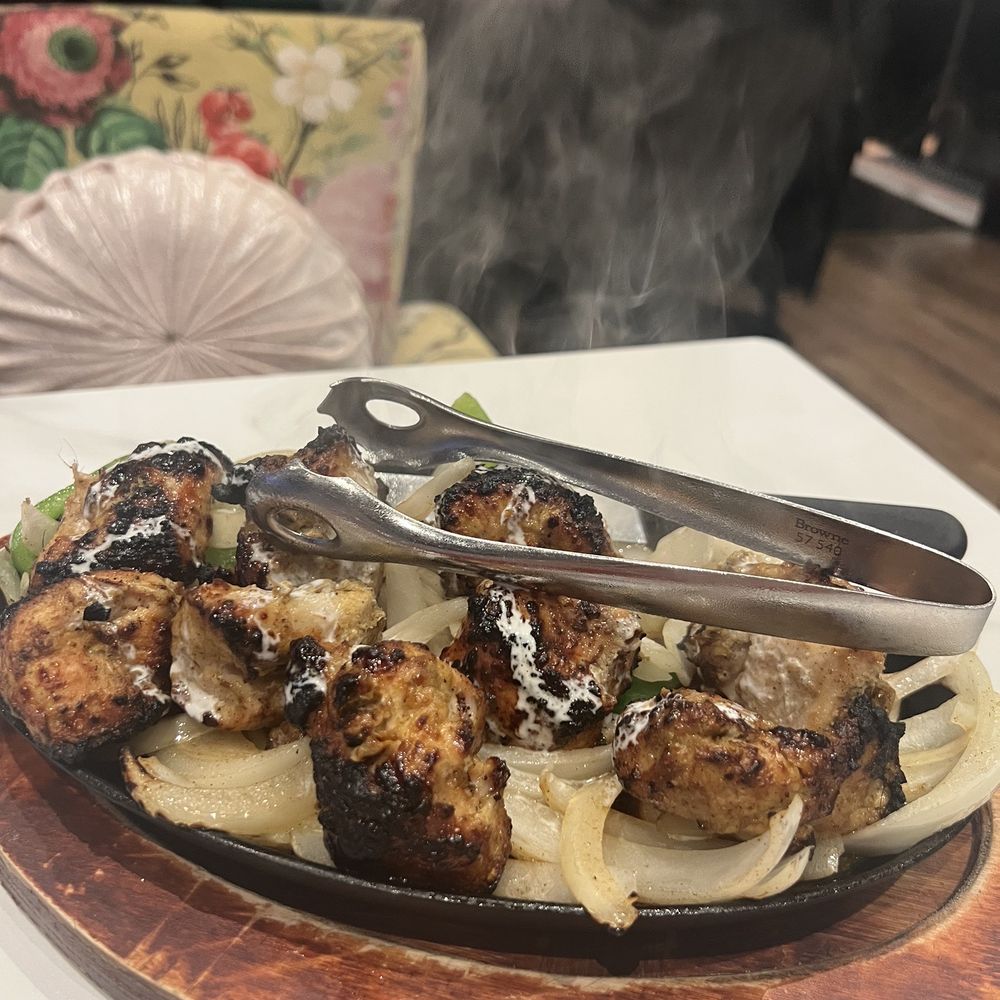 Sofi'z Kitchen & Bar - a plate of food - Pakistani Near Me - Chico, California Sofi'z Kitchen & Bar - a plate of food - Pakistani Near Me - Chico, California