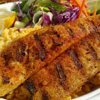 Fish-O-Licious - My favorite cajun spices with brown rice and grilled zucchini! - Seafood Near Me - Los Angeles, California