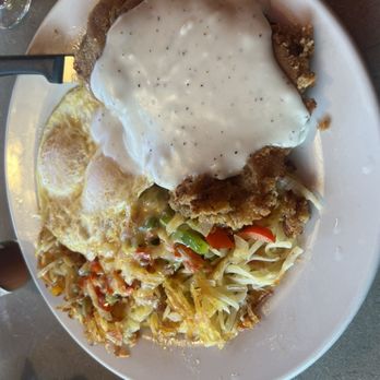 Country Cafe Ridgefield - 6oz chicken fried steak with loaded country hashbrowns and 2 eggs over easy! Also served with toast (not pictured) - American Near Me - Ridgefield, Washington