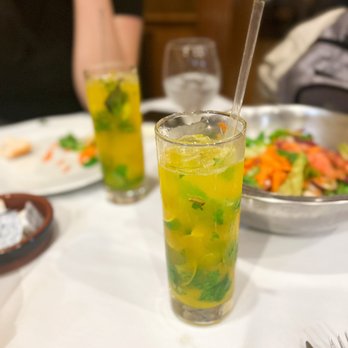 Valença Restaurant - a glass of lemonade and a plate of salad - Steakhouses Near Me - Elizabeth, New Jersey