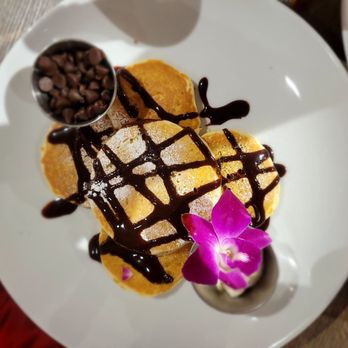 Sweet Cafe - chocolate chip Pancakes with chips on the side - Breakfast & Brunch Near Me - Chicago, Illinois Sweet Cafe - chocolate chip Pancakes with chips on the side - Breakfast & Brunch Near Me - Chicago, Illinois