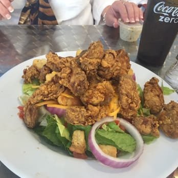 Peck's Seafood Restaurant - Fried Oyster Salad - Cajun/Creole Near Me - Slidell, Louisiana Peck's Seafood Restaurant - Fried Oyster Salad - Cajun/Creole Near Me - Slidell, Louisiana