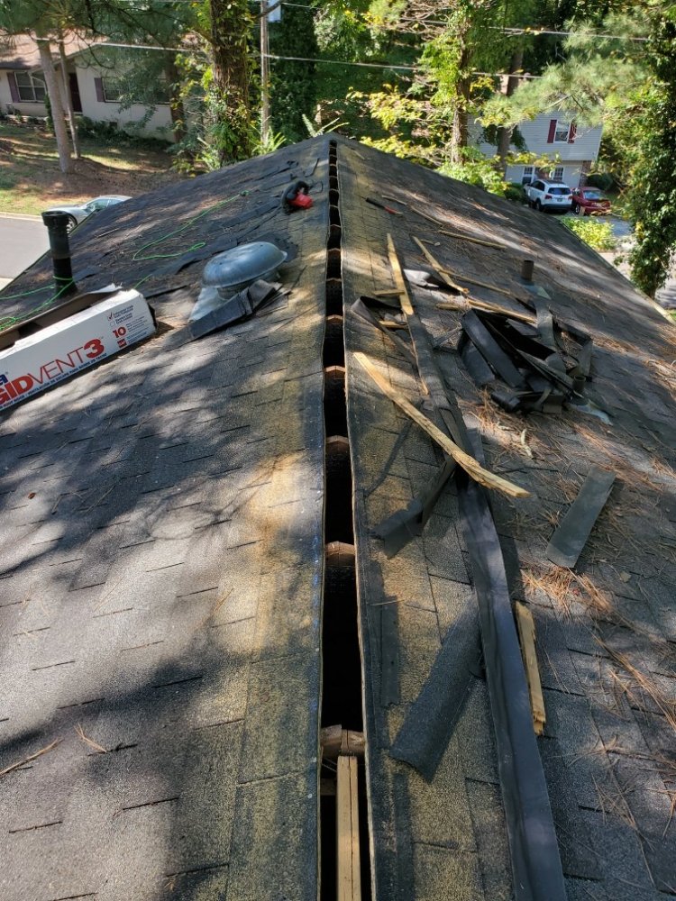 Slide of Rashids Roofing