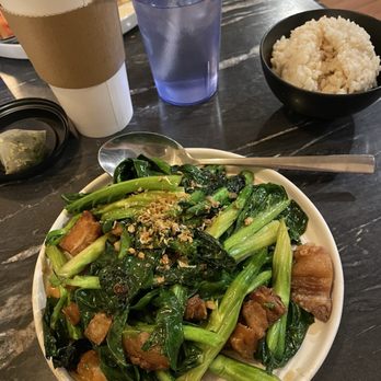 The Basil - Chinese broccoli with pork belly and brown rice. Hot green tea. - Thai Near Me - Long Beach, California The Basil - Chinese broccoli with pork belly and brown rice. Hot green tea. - Thai Near Me - Long Beach, California