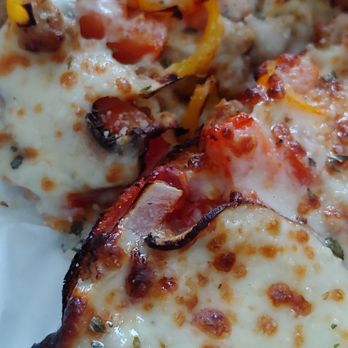 Pizza Brigade - This is Hippie Chick, minus the green peppers and black olives, plus sausage. I love their French bread style pizza! - Pizza Near Me