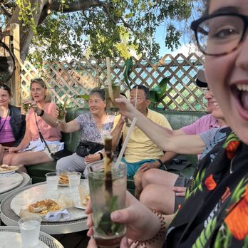 Miami Culinary Tours - Cubano sandwiches in a hidden terrace with tour guests - Food Tours Near Me - Miami Beach, Florida Miami Culinary Tours - Cubano sandwiches in a hidden terrace with tour guests - Food Tours Near Me - Miami Beach, Florida