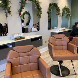 Charlotte Brow Bar & Aesthetics - New location with several chairs in the front room.