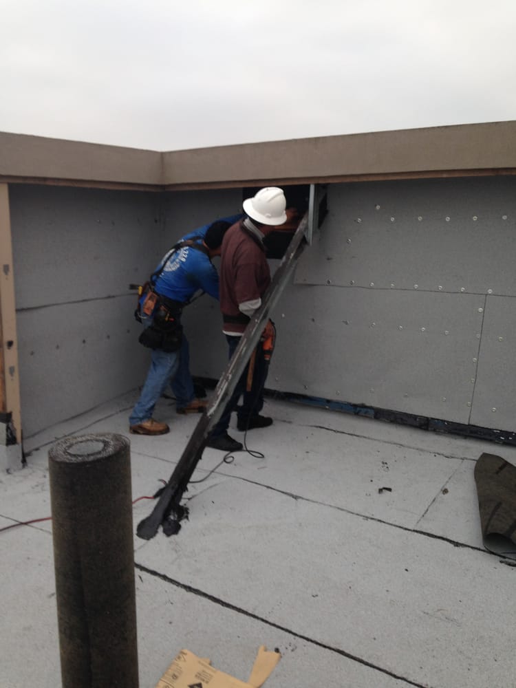 Slide of Hector's Roofing