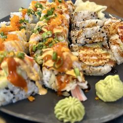 Sushi Primos - Left spicy Latina  Middle panther roll  Right rock and roll