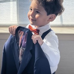 B. Nathaniel Custom Clothiers - The liner in the suit was everything!!! All Custom photos of my daughter and her wife! Nothing short of amazing!