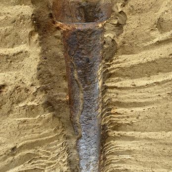 McClure Realty Vacations - Old sewage pipe in the sand under the house - Property Management Near Me - Ocean Isle Beach, North Carolina McClure Realty Vacations - Old sewage pipe in the sand under the house - Property Management Near Me - Ocean Isle Beach, North Carolina