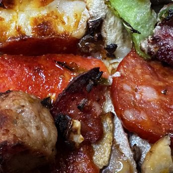 Bronco Billy's Pizza Niles - Up close, chuck wagon slice. - Pizza Near Me - Fremont, California