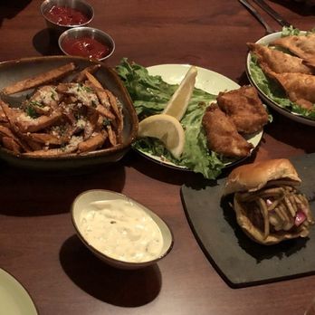 The Twisted Griffin - a table full of food - Irish Pub Near Me - Estes Park, Colorado The Twisted Griffin - a table full of food - Irish Pub Near Me - Estes Park, Colorado