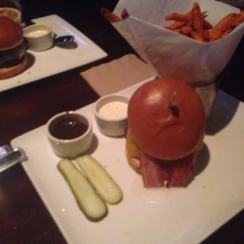 Yard House - BBQ Bacon Cheddar burger with sweet potato fries at Yard House. Ridge Hill Yonkers. - New American Near Me - Yonkers, New York