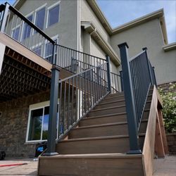 Global Cooperation - Steel railings on a composite deck stairs in Aurora