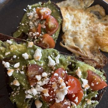 The Treehouse - Avocado Toast with over easy egg - New American Near Me - Nashville, Tennessee The Treehouse - Avocado Toast with over easy egg - New American Near Me - Nashville, Tennessee