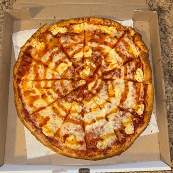 Nimarcos Pizza - Westside - Large cheese pizza with a hot honey drizzle and ricotta - Pizza Near Me - Flagstaff, Arizona