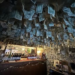 Depoe Bay Winery - Hanging bills & wine tasting.