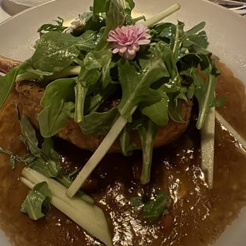Kennedy's Steakhouse - Pork Chop topped with arugula - Steakhouses Near Me - Eugene, Oregon Kennedy's Steakhouse - Pork Chop topped with arugula - Steakhouses Near Me - Eugene, Oregon