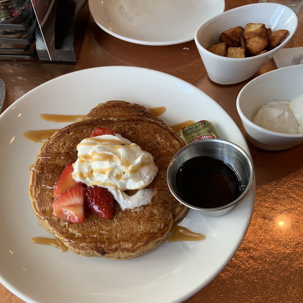 Another Broken Egg Cafe - Ipanema Estates Pancakes with poached eggs - Breakfast & Brunch Near Me - Delray Beach, Florida