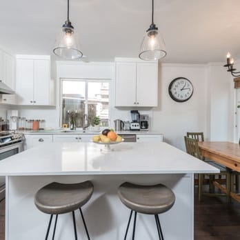 Vancouver General Contractors - a kitchen with a center island - Interior Design Near Me - Vancouver, British Columbia Vancouver General Contractors - a kitchen with a center island - Interior Design Near Me - Vancouver, British Columbia