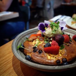 Blueberry and ricotta hotcake with berries, organic maple and double cream! Blueberry and ricotta hotcake with berries, organic maple and double cream!