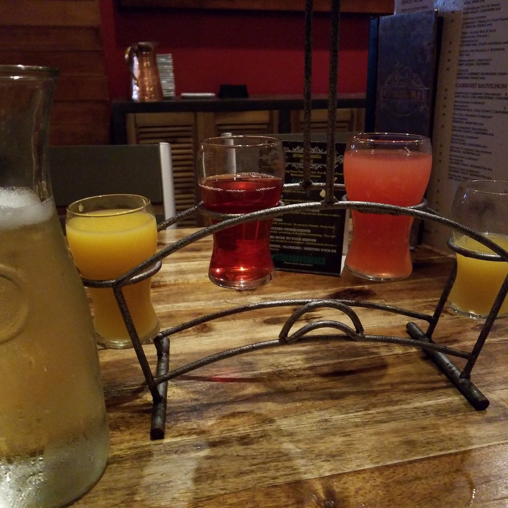 The Stubborn Mule - Champagne refill, orange, cranberry, grapefruit and pineapple juice. Genius idea for refills for smaller groups. - New American Near Me - Orlando, Florida The Stubborn Mule - Champagne refill, orange, cranberry, grapefruit and pineapple juice. Genius idea for refills for smaller groups. - New American Near Me - Orlando, Florida