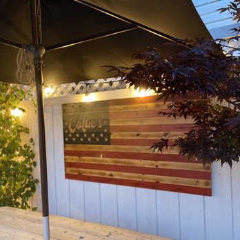 Callie's - an american flag painted on the side of a building - Sandwiches Near Me - Queens, New York