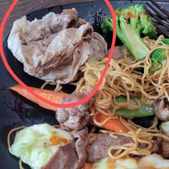 Pho May - Beef chowmein with a napkin buried in the middle of the dish. - Vietnamese Near Me - Cypress, California Pho May - Beef chowmein with a napkin buried in the middle of the dish. - Vietnamese Near Me - Cypress, California