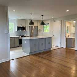 Handy Hawaii - New open concept kitchen. Removed canex ceiling and replaced with drywall with a smooth finish. Herring bone tile in kitchen.