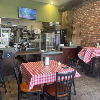 Pepe's NY Pizza - tables and chairs in a restaurant - Pizza Near Me - Studio City, California Pepe's NY Pizza - tables and chairs in a restaurant - Pizza Near Me - Studio City, California