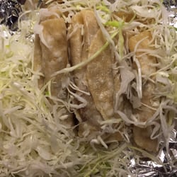 Cow Taco Eagle Pass - Tacos under the cabbage.