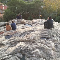 Looking down from the top of the rock.  Everyone else is looking out at the drop-dead view.