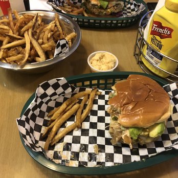 The Burger Point - Half eaten super delicious veggie burger and fries on the side - Burgers Near Me - Chicago, Illinois