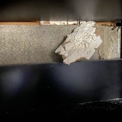 Closets by Design - Raleigh - they put the shelf right over the hole and left the plaster!