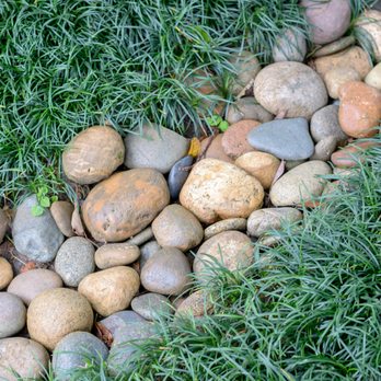 Top Notch Tree Care - a pile of rocks and grass - Landscaping Near Me - Simi Valley, California Top Notch Tree Care - a pile of rocks and grass - Landscaping Near Me - Simi Valley, California