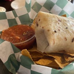 Brisket burrito with tortilla chips and salsa Brisket burrito with tortilla chips and salsa