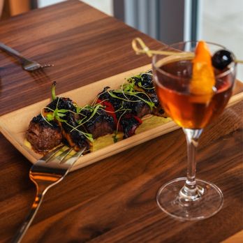 Ember Kitchen - Night on the Square cocktail (their take on a Vieux Carre) and Filet Skewers - Latin American Near Me - Austin, Texas