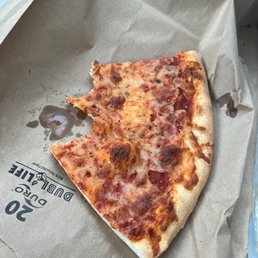 a slice of pizza in a box