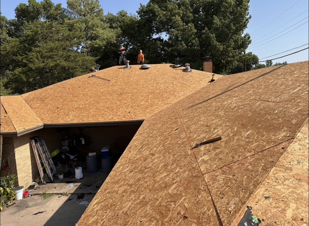 Slide of Homer’s Roofing & Construction