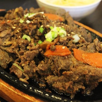 Seoul Restaurant - Bulgogi (marinated grilled thin-sliced beef Ribeye) on a sizzling iron plate - Korean Near Me - Chattanooga, Tennessee