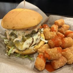Keystone Pub Grub - Green chili smash burger with tots!