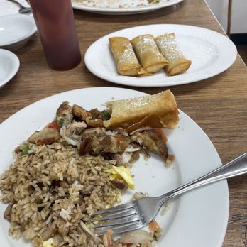 Shay's Filipino Cafe - 2 of us eating this serving of the adobo omelet and banana lumpia - Filipino Near Me - Waipahu, Hawaii Shay's Filipino Cafe - 2 of us eating this serving of the adobo omelet and banana lumpia - Filipino Near Me - Waipahu, Hawaii