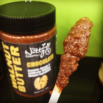 The Nutty Gourmet - Eating the Chocolate Walnut butter - deliciousness on a stick! - Specialty Food Near Me - Hughson, California