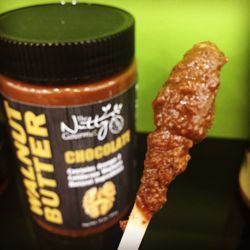 The Nutty Gourmet - Eating the Chocolate Walnut butter - deliciousness on a stick!