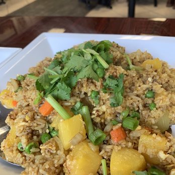 Laos Thai Kitchen - Pineapple curry fried rice - Thai Near Me - Lowell, Massachusetts Laos Thai Kitchen - Pineapple curry fried rice - Thai Near Me - Lowell, Massachusetts