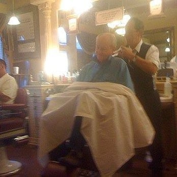 The Elite Barber Shop - Guy applying back massage. - Barbers Near Me - New Braunfels, Texas The Elite Barber Shop - Guy applying back massage. - Barbers Near Me - New Braunfels, Texas