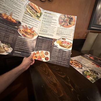 Hacienda Mis Padres Mexican Grill - A really big menu as in size it is large and nicely done. - Mexican Near Me - Conroe, Texas Hacienda Mis Padres Mexican Grill - A really big menu as in size it is large and nicely done. - Mexican Near Me - Conroe, Texas