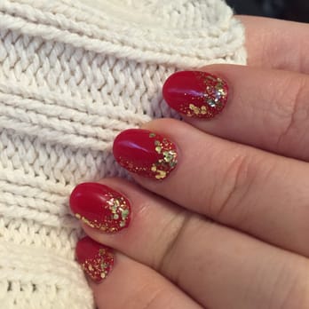Four Season Nails - Christmas acrylic nails  I wasn't sure what I wanted, but Sunny is always good about designing your nails if you give her a basic idea - Nail Salons Near Me - Edison, New Jersey