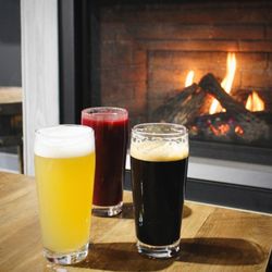 Definitive Brewing Company - A cozy fireplace for cooler months!
